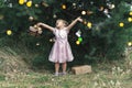 Cute little girl on the background of christmas decor Royalty Free Stock Photo