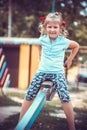 Cute little girl on the playground.