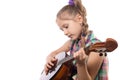 Cute little girl playing on domra. Studio photo