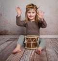 Cute little girl playing drum Royalty Free Stock Photo