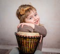 Cute little girl playing drum Royalty Free Stock Photo