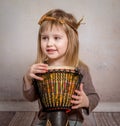 Cute little girl playing drum Royalty Free Stock Photo