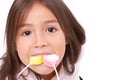 Cute little girl playing, eating sugar jelly sweet candy