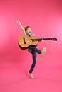 Cute little girl playing guitar Royalty Free Stock Photo