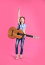 Cute little girl playing guitar Royalty Free Stock Photo