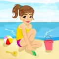 Cute little girl playing with sand on beach Royalty Free Stock Photo