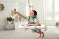 Cute little girl playing on swing at home Royalty Free Stock Photo