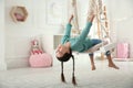 Cute little girl playing on swing Royalty Free Stock Photo