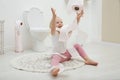 Cute little girl playing with toilet paper Royalty Free Stock Photo