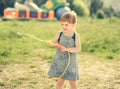 Cute little girl playing water gun Royalty Free Stock Photo