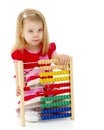 The girl counts on abacus