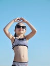 Cute little girl plays on the beach. Royalty Free Stock Photo