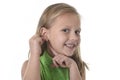 Cute little girl pointing her ear in body parts learning school chart serie