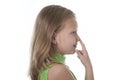 Cute little girl pointing her nose in body parts learning school chart serie Royalty Free Stock Photo