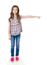 Cute little girl is pointing to the side isolated Royalty Free Stock Photo