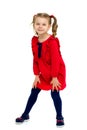 Cute little girl with ponytails in red dress Royalty Free Stock Photo