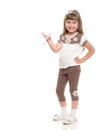 Cute little girl posing in the studio and point to somewhere or Royalty Free Stock Photo