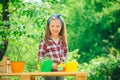 Cute little girl with pot. Happy childhood concept. Small girl enjoy childhood years on farm. Eco living. Child Royalty Free Stock Photo