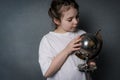 Cute little girl in pre-adolescence looking at the globe. Education concept. Selected Focus Royalty Free Stock Photo
