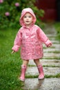 Cute little girl in the rain