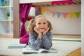 Cute little girl read book at home Royalty Free Stock Photo