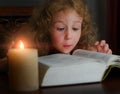 Cute little girl reading a book Royalty Free Stock Photo