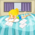 Cute little girl is reading books on her bed Royalty Free Stock Photo