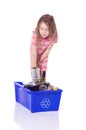 Young girl recycling