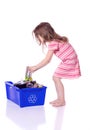 Young girl recycling