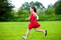 Cute little girl running Royalty Free Stock Photo
