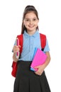 Cute little girl in school  with backpack and stationery on white background Royalty Free Stock Photo