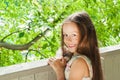 Beautiful little girl in summer background Royalty Free Stock Photo