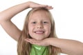 Cute little girl showing head in body parts learning school chart serie Royalty Free Stock Photo