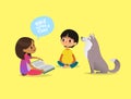 Cute little girl sits on floor and tells fairytale to her friend and pet dog. Kids reading fairy tales book. Concept of
