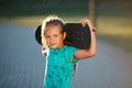 Cute little girl with skateboard