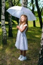 Beautiful little girl looks away dreaming Royalty Free Stock Photo