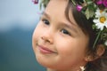 Cute little girl smilling while looking aside Royalty Free Stock Photo