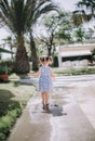 Cute little girl spanking in puddles