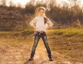 Cute little girl standing on a road Royalty Free Stock Photo