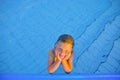 Cute little girl in the swimming pool. Portrait of little cute girl in the swimming pool. Sunny summer day. Summer and happy chil Royalty Free Stock Photo