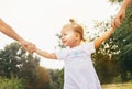 Cute little girl take hands with her relatives people Royalty Free Stock Photo