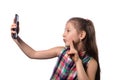 Cute little girl taking a selfie on her phone Royalty Free Stock Photo