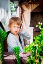 cute little girl talking on the phone. Child with mobile , angry, serious. Looking at the camera. Royalty Free Stock Photo