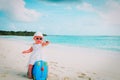 Cute little girl travel on summer beach Royalty Free Stock Photo