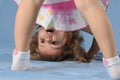 Cute little girl upside down