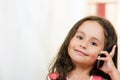 Cute little girl using cell phone Royalty Free Stock Photo