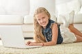 Cute little girl using laptop Royalty Free Stock Photo