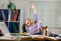 Cute little girl using laptop to study online at home. Royalty Free Stock Photo