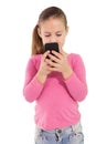 Cute little girl using smartphone Royalty Free Stock Photo