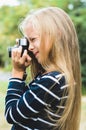 Cute little girl with a vintage rangefinder camera.